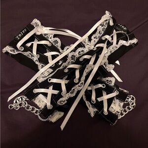 Black Lace-Up Wrist Cuffs with White Ribbon Lacing